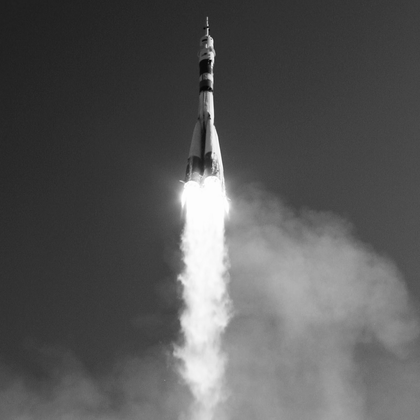 Liftoff image, a rocket with flames leaving earth